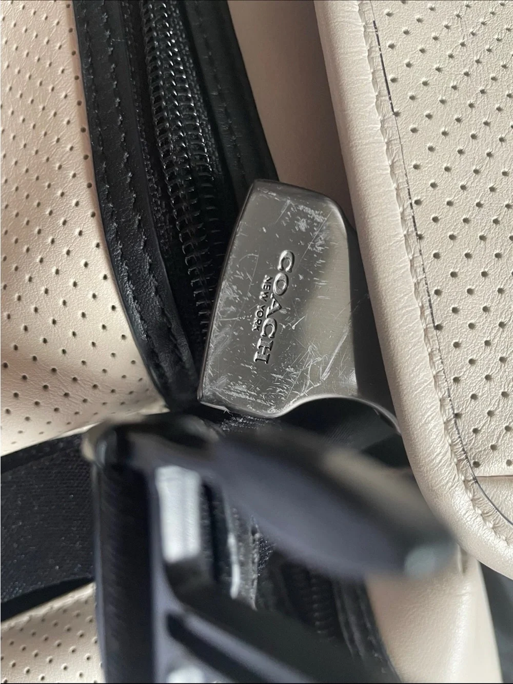 Coach Two-Tone Cream and Black Perforated Leather Backpack